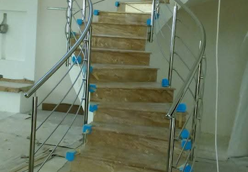 Curves in Stainless-Steel: The Elegant Stairway